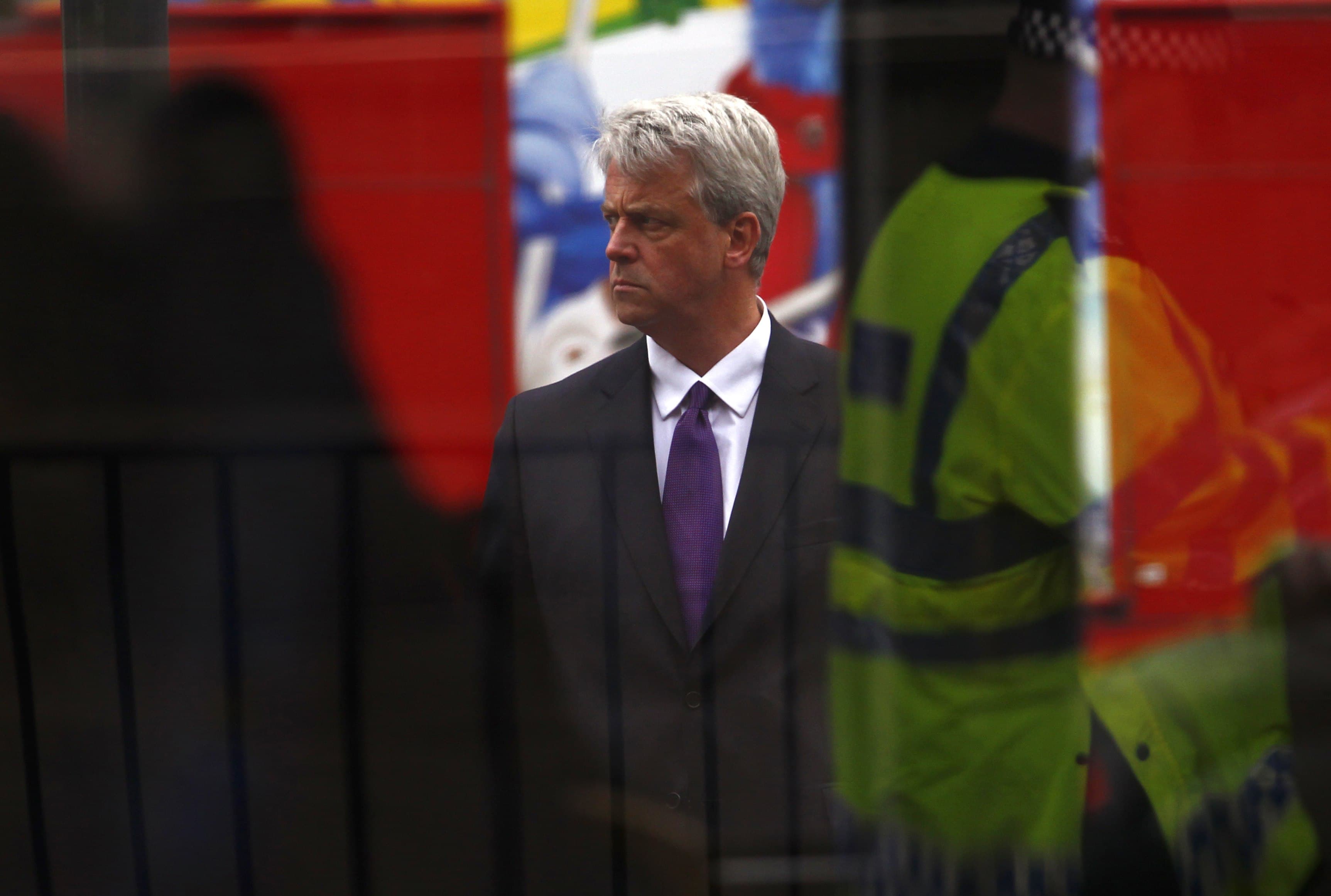 Britain's former Health Secretary, and current Leader of the House, Andrew Lansley waits to cross the road after attending a cabinet meeting in Westminster, 17 May 2011. Lansley is a sponsor of what some refer to as "the gagging bill.", REUTERS/Andrew Winning