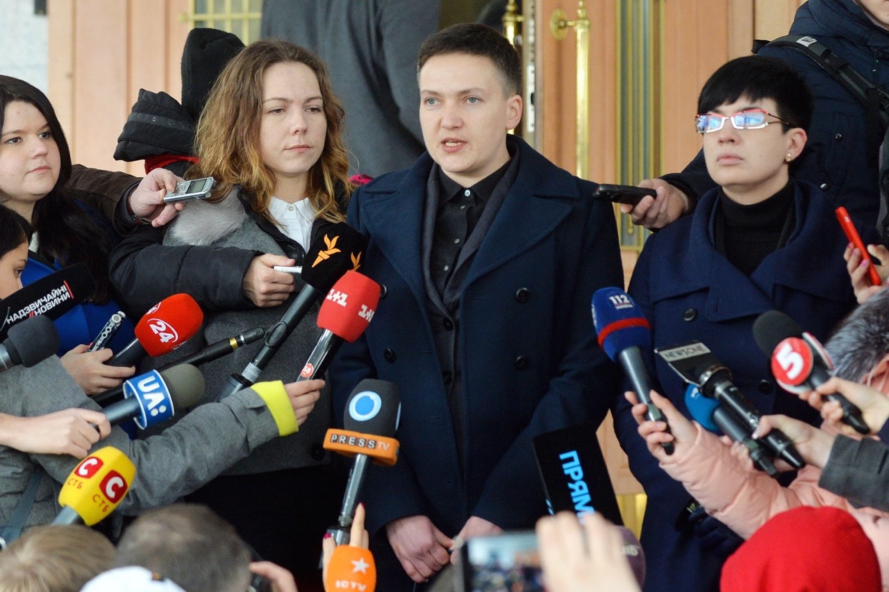 A former pilot talks to journalists outside the offices of the Security Service of Ukraine (SBU), in Kiev, 15 March 2018, Pyotr SivkovTASS via Getty Images