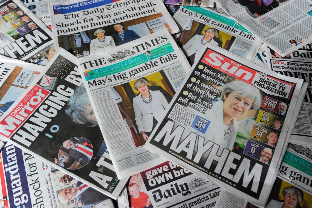 An arrangement of British daily newspapers showing front page stories about the exit poll results of the snap general election, in London, 9 June 2017, DANIEL SORABJI/AFP/Getty Images