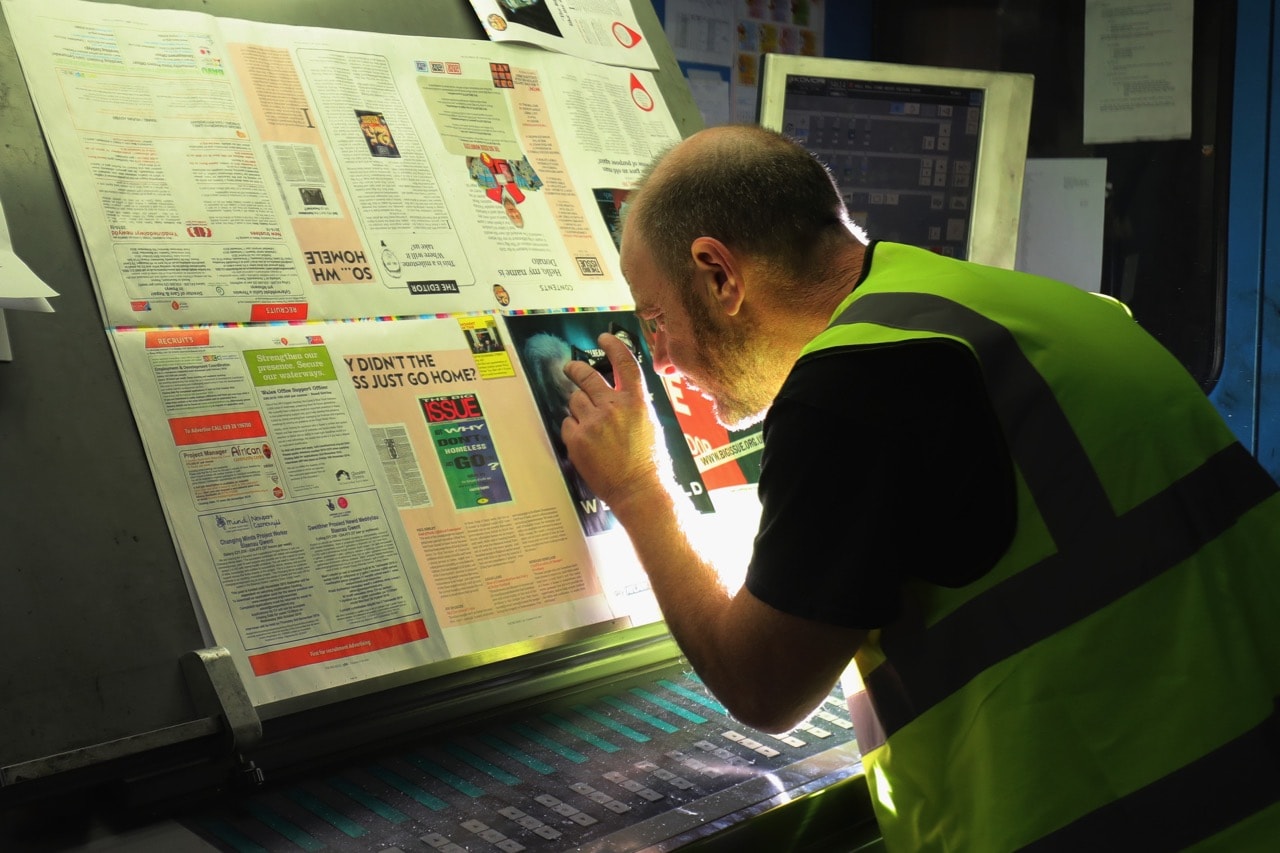 A web printer inspects pages of "The Big Issue" publication as it rolls off the printing press in Wolverhampton, England, 14 October 2016 , Christopher Furlong/Getty Images