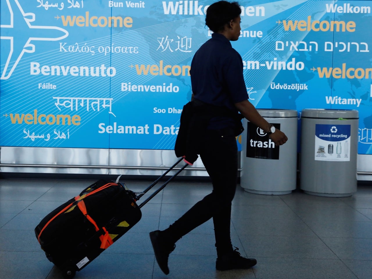 International travelers arrive at John F. Kennedy international airport in New York City, 4 February 2017, REUTERS/Brendan McDermid