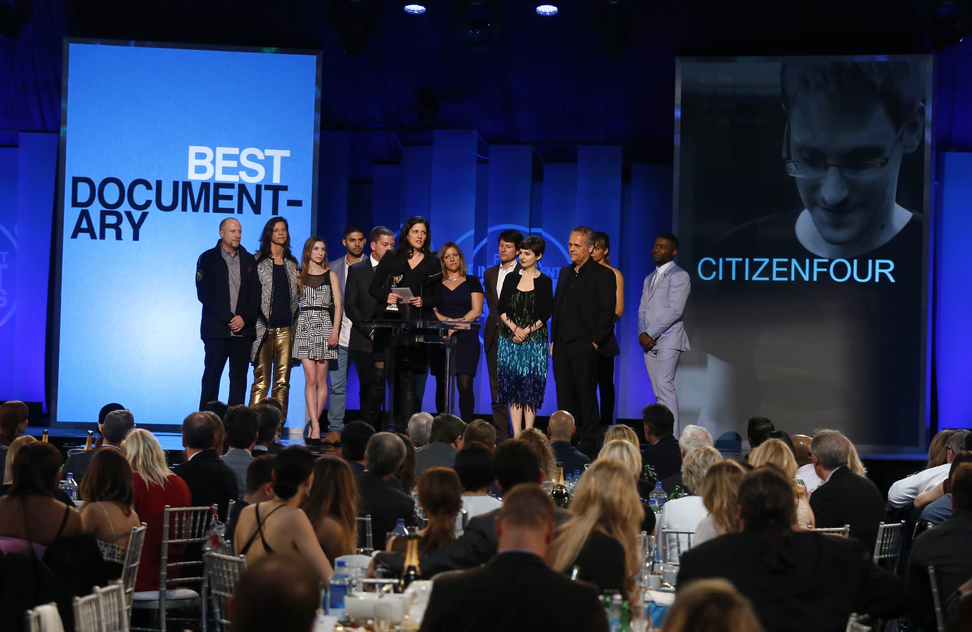 Director Laura Poitras (C) accepts the award for best documentary for her film "Citizenfour" at the 2015 Film Independent Spirit Awards in Santa Monica, California, 21 February 2015, REUTERS/Adrees Latif