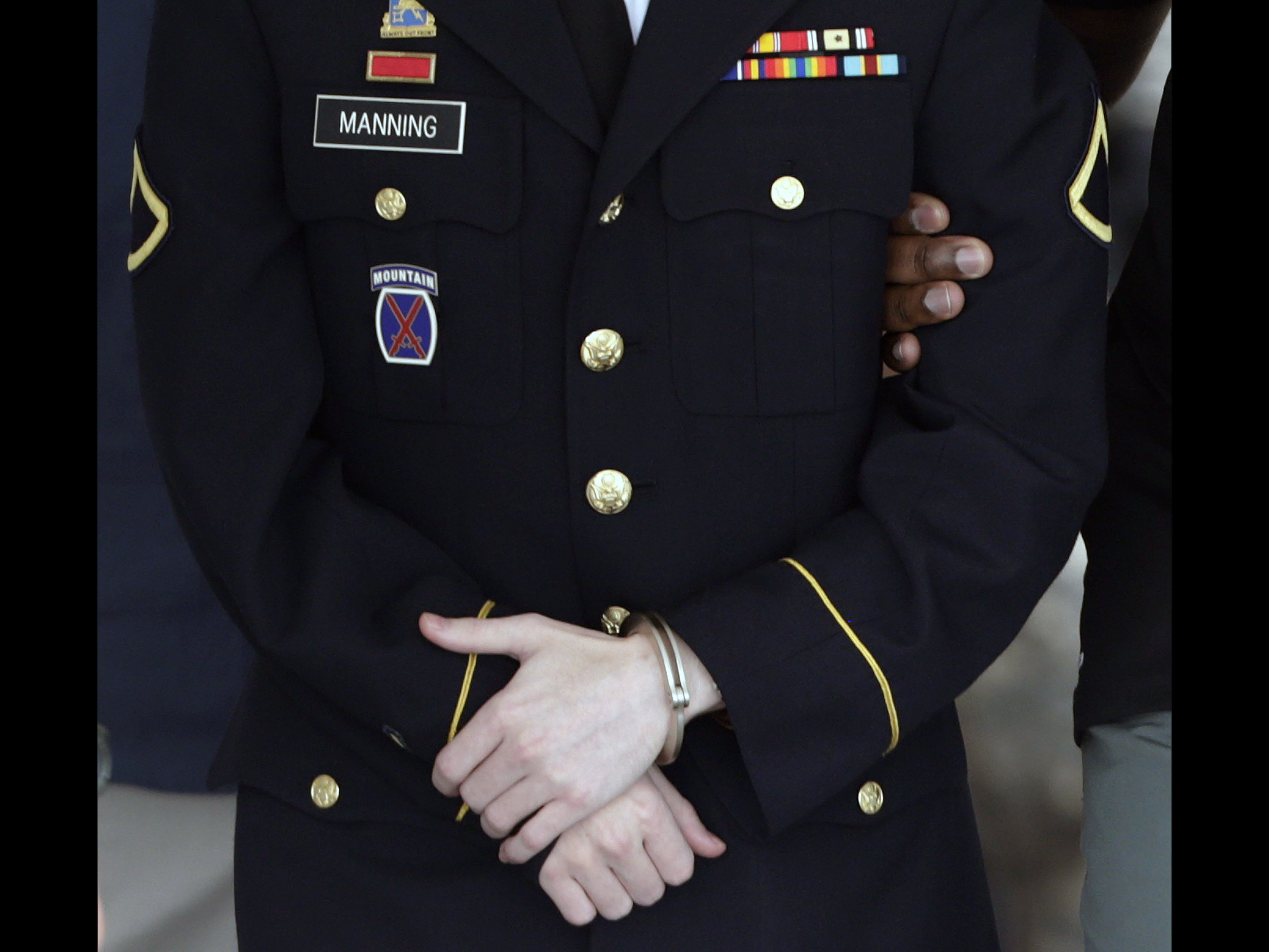 The uniform, handcuffs, nametag and service ribbons of U.S. Army Private Bradley Manning are seen as he departs the courthouse at Fort Meade on July 30, 2013, REUTERS/Gary Cameron