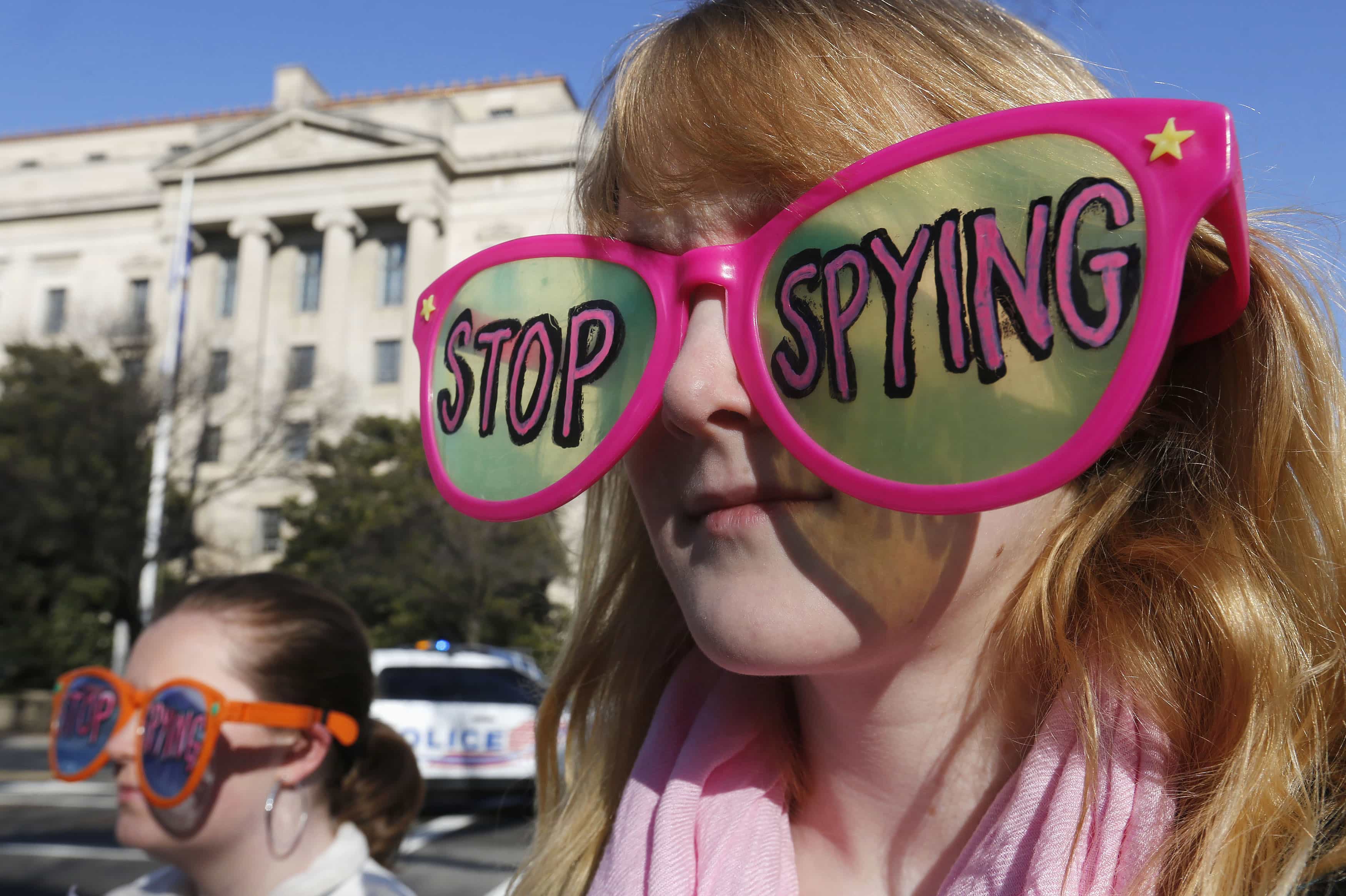Protesters from the group Code Pink demonstrate outside the Department of Justice in Washington before Obama’s speech on 17 January 2014, REUTERS/Larry Downing