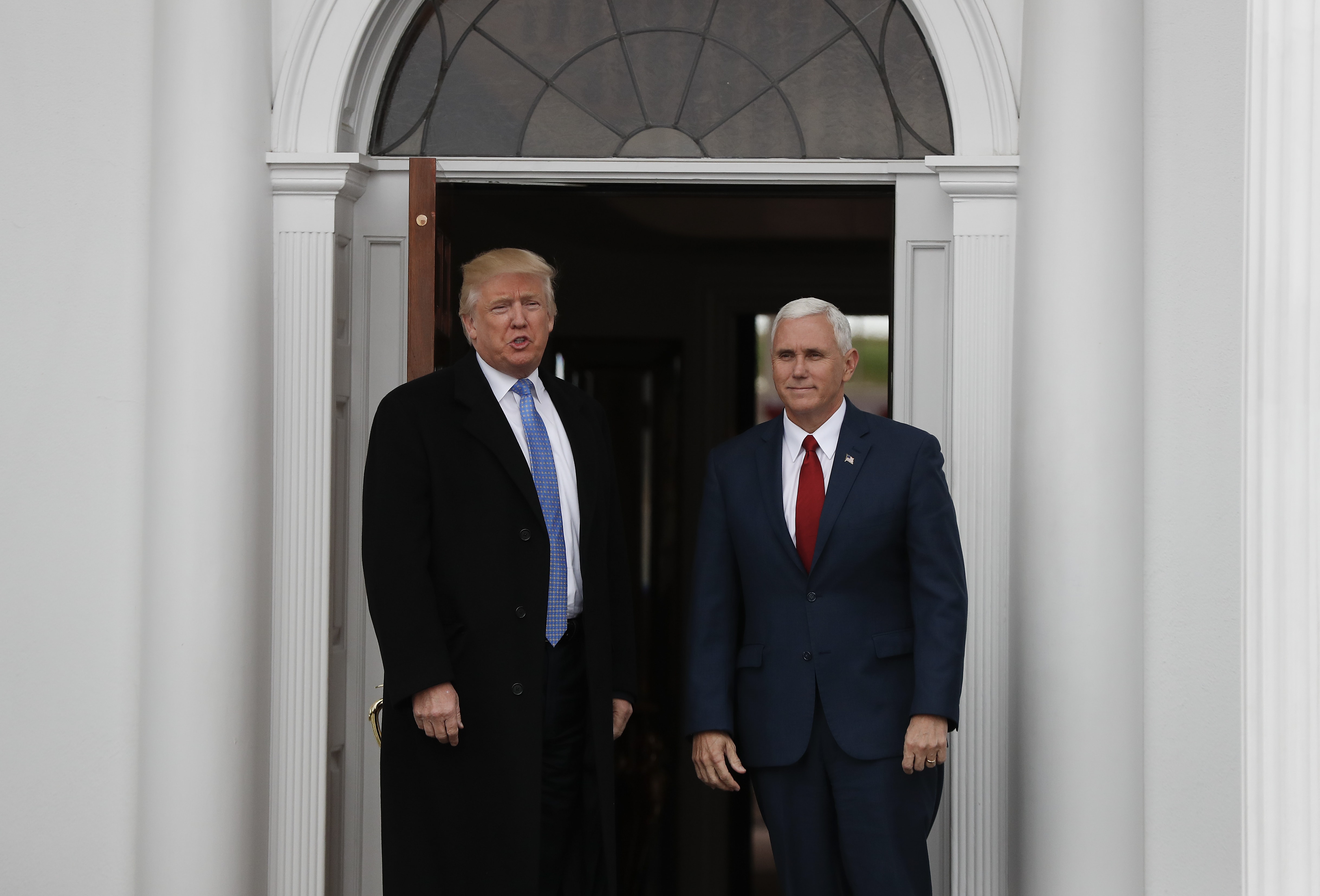 President-elect Donald Trump and Vice President-elect Mike Pence stand together in the entryway of Trump National Golf Club Bedminster clubhouse, AP Photo/Carolyn Kaster
