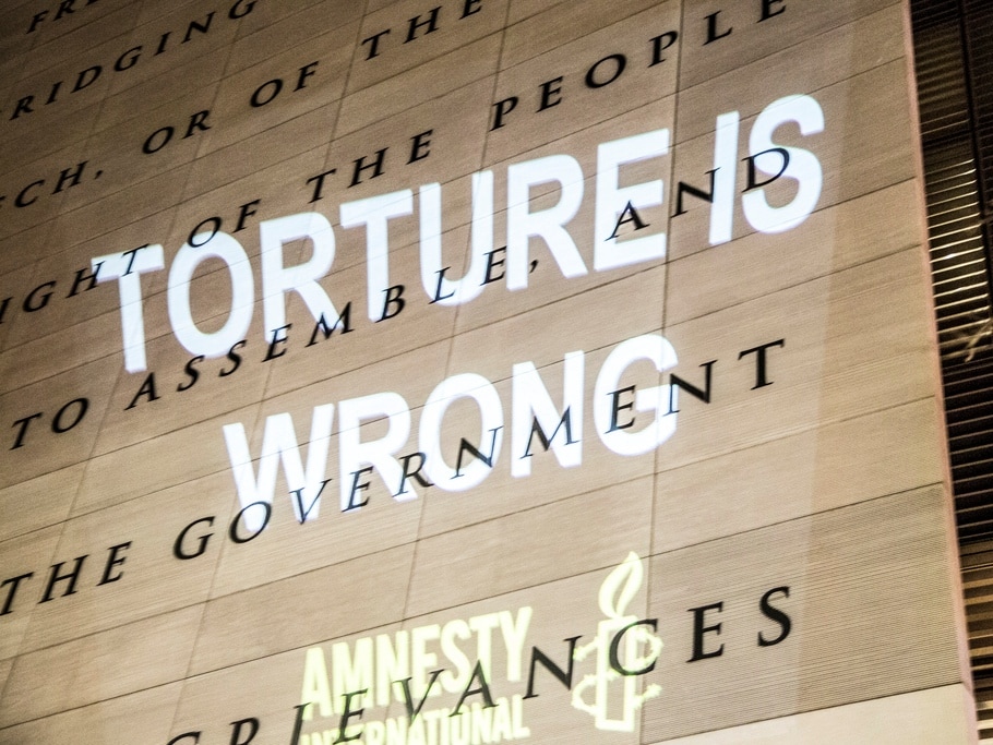 Members of Witness Against Torture and Amnesty International projected the message, "Torture Is Wrong", at Washington D.C.'s Newseum on 8 January 2013., Flickr/Justin Norman/Shrieking Tree