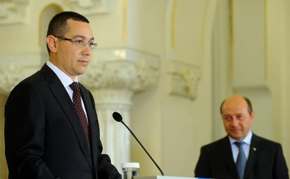 Romania’s Parliament, led by Prime Minister Victor Ponta (left), voted to recriminalise insult and libel, a move that President Traian Basescu (right) promised to veto., http://www.victorponta.ro/