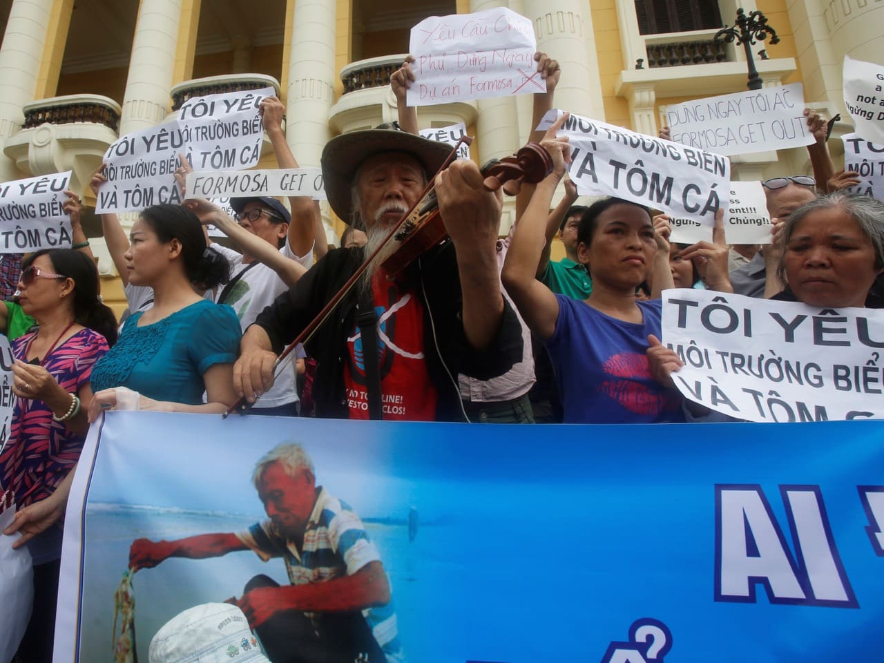 On 1 May 2016, violinist Ta Tri Hai performs during a protest in Hanoi, against a unit of Taiwan's Formosa Plastics, a firm activists blame for causing an environmental disaster in April, REUTERS/Kham