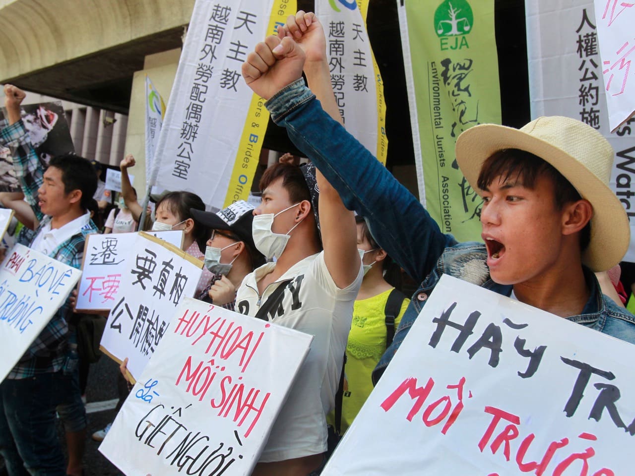 Vietnamese environmental activists protest an industrial accident that caused tons of fish to wash up on Vietnamese shores at a 10 August 2016 demonstration in Taipei, Taiwan. Detained videographer Nguyen Van Hoa published online videos of similar protests in Vietnam, AP/Chiang Ying-ying