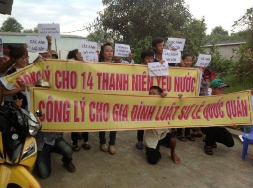 Family members and supporters rally to demand freedom for human rights defenders on 23 May 2013 in Vinh City, Vietnam, ARTICLE 19