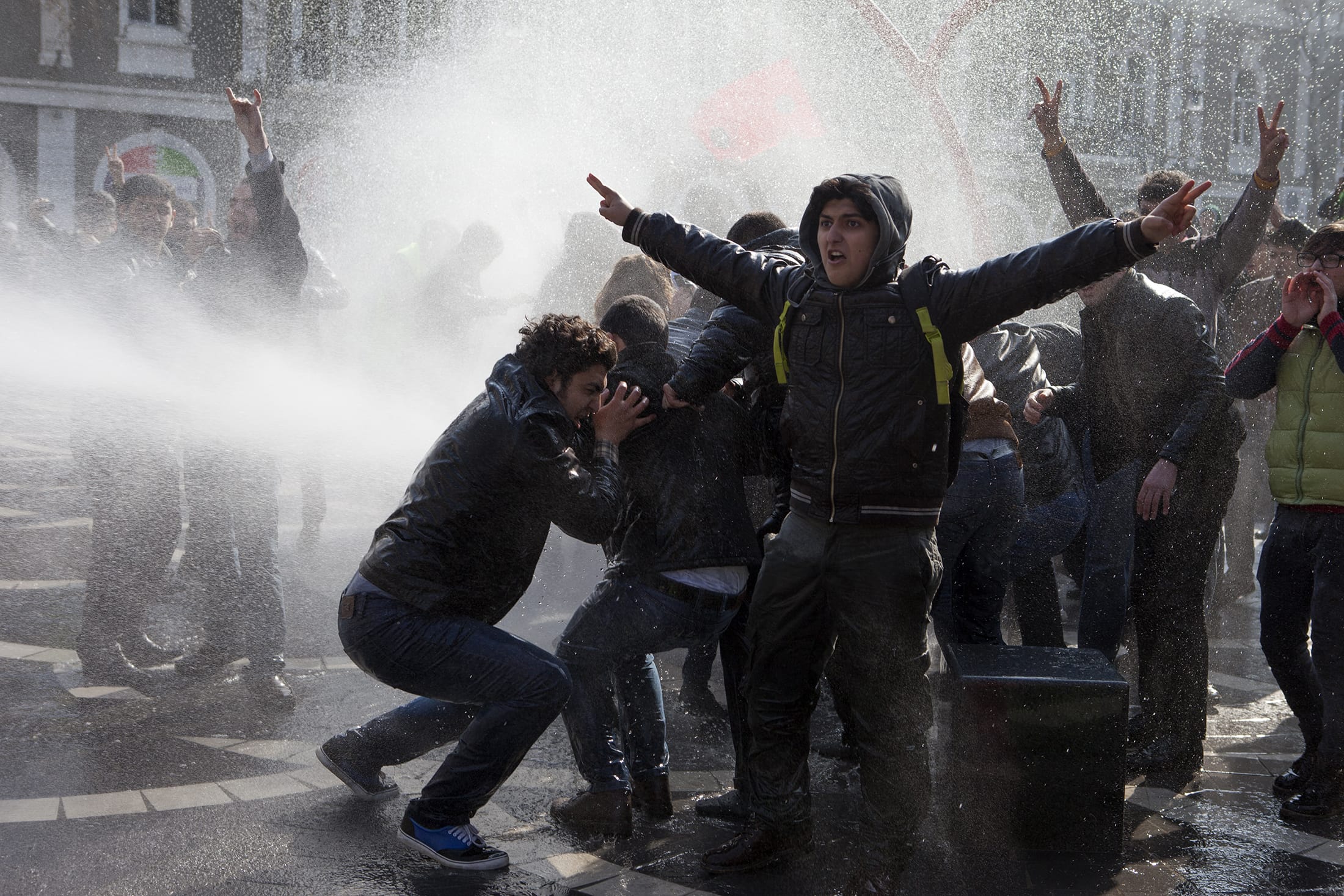 Policemen use water cannons to break up the crowd of protesters during a rally in Baku, 10 March 2013. , REUTERS/Elmar Mustafazadeh