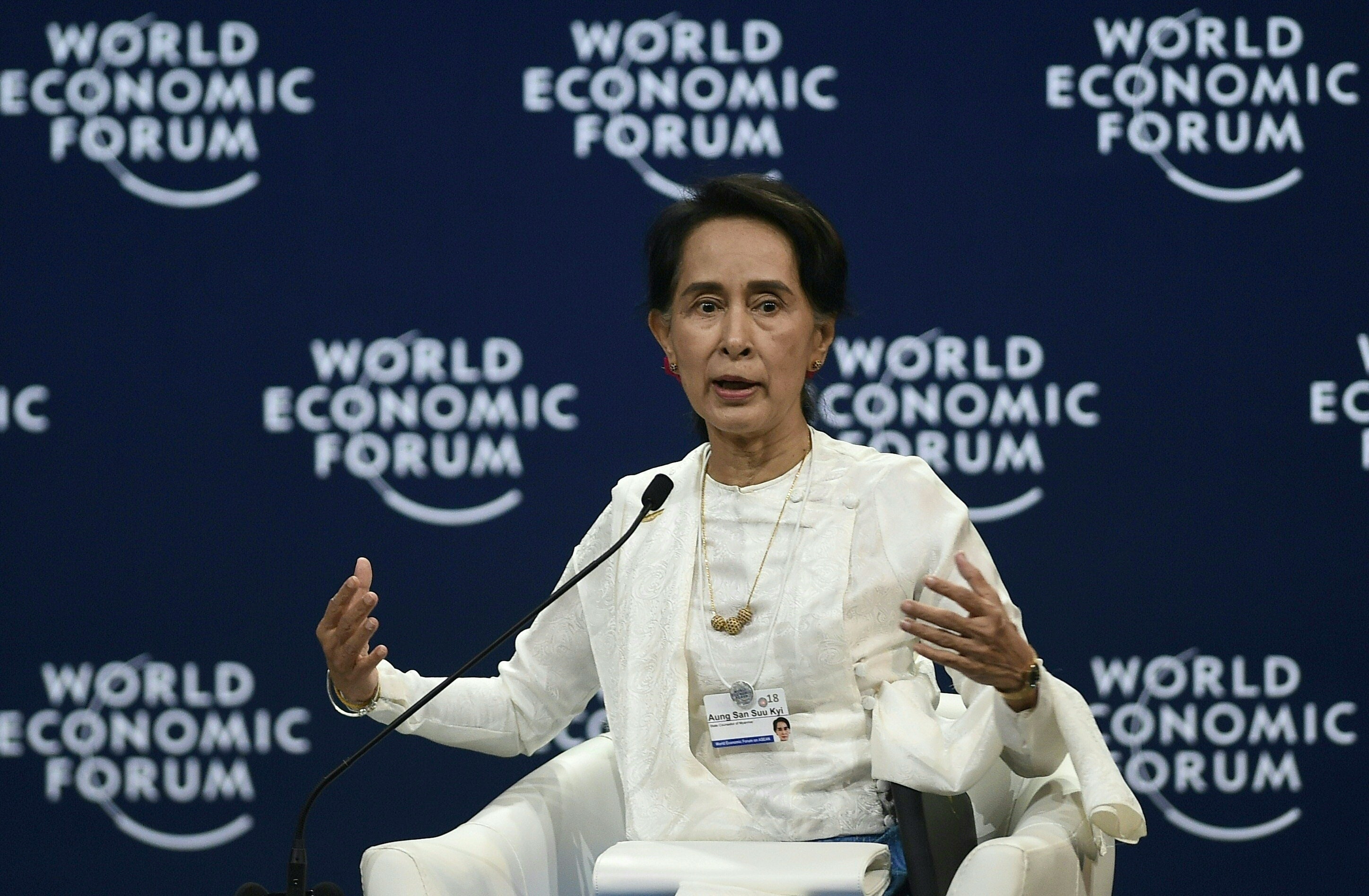 Aung San Suu Kyi at the World Economic Forum defending the imprisonment of two Reuters journalists and issuing a challenge to prove the sentencing was unjust., YE AUNG THU/AFP/Getty Images