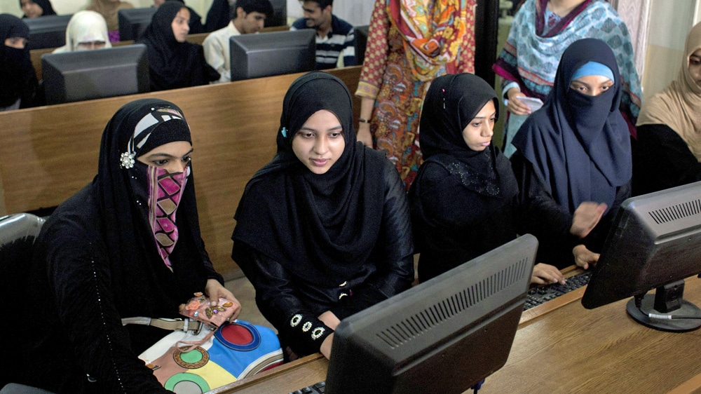 University students search the internet in Karachi, Pakistan., Associated Press