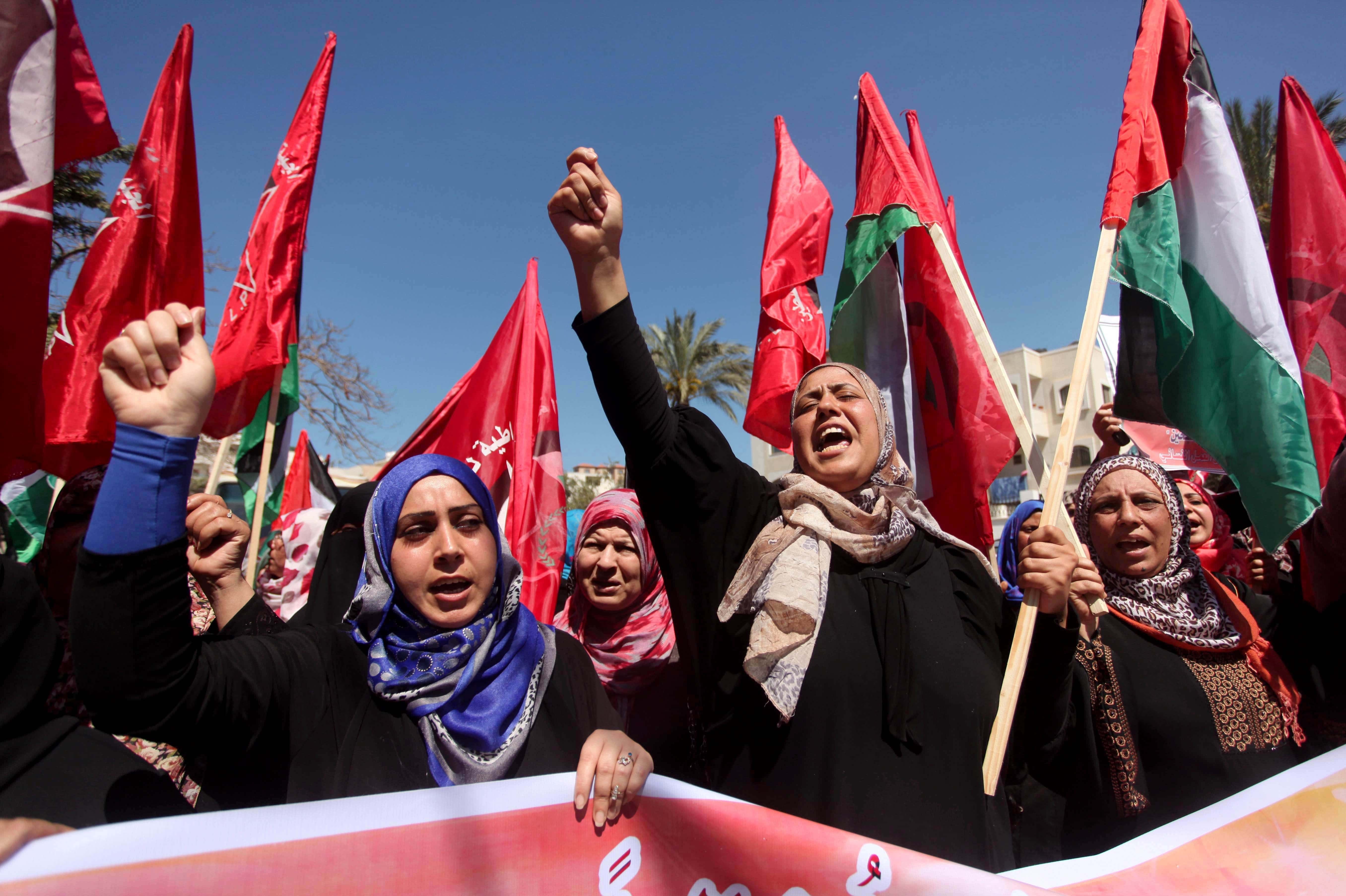 Demonstrators demanding the protection of Palestinian refugees, protest against the Yarmouk Refugee Camp clashes outside the UN office in Gaza City, Gaza, Palestine, 2015, Ashraf Amra/Anadolu Agency/Getty Images