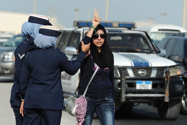 Zainab Al-Khawaja being arrested during one of her many protests in Bahrain in 2012., BCHR