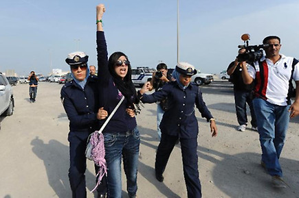 Bahraini rights defender Zainab Al-Khawaja being arrested at AlEker village, Mahmood Alshaikh