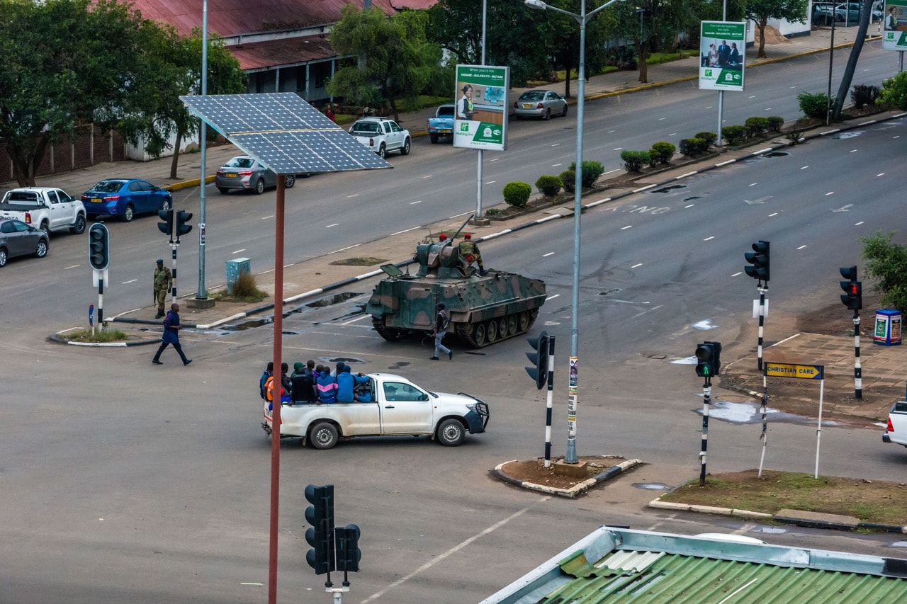 An armoured personnel carrier is stationed at an intersection as Zimbabwean soldiers regulate traffic in Harare, 15 November 2017,  -/AFP/Getty Images