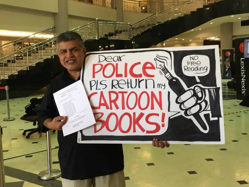 Zunar, after filing his lawsuit against the Malaysian government, Facebook page of Zunar Cartoonist Fan Club