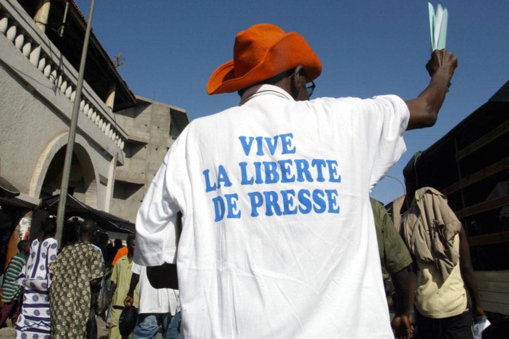 A supporter of a jailed journalist Madiambal Diagne participates in a rally in Dakar, Senegal, 23 July 2004, SEYLLOU/AFP/Getty Images