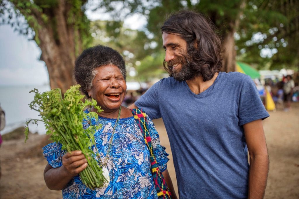 Kurdish refugee Behrouz Boochani, with one of his friends, a local resident, on Manus island, 8 February 2018, Jonas Gratzer/LightRocket via Getty Images