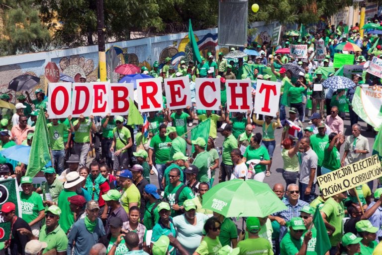 People take part in a march against corruption and scandals linked to Brazil's construction giant Odebrecht, in Azua de Compostela, Dominican Republic, 21 May 2017, ERIKA SANTELICES/AFP/Getty Images