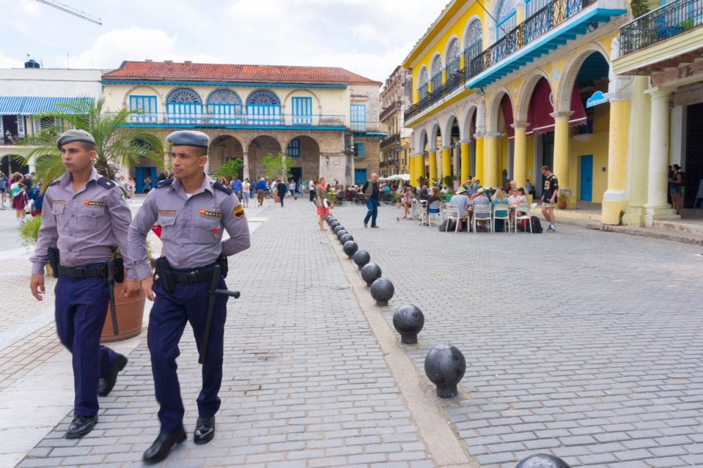 Cuban policemen walking in the Old Plaza, in Havana, 15 March 2017, Roberto Machado Noa/LightRocket via Getty Images