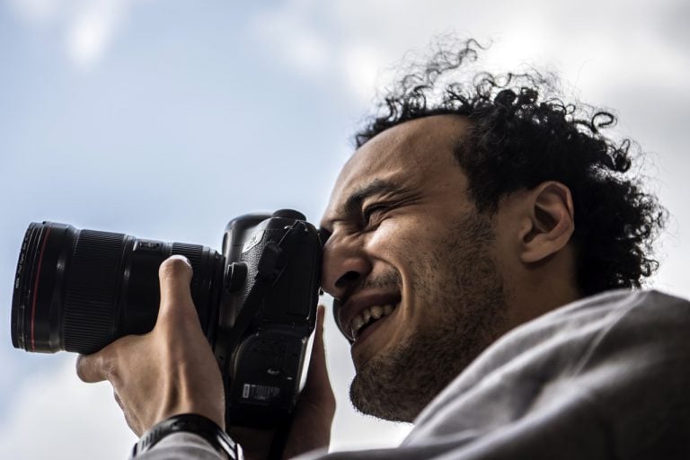 Egyptian photojournalist Mahmoud Abu Zeid, widely known as Shawkan, shoots with a camera at his home in the capital Cairo, 4 March 2019, KHALED DESOUKI/AFP/Getty Images