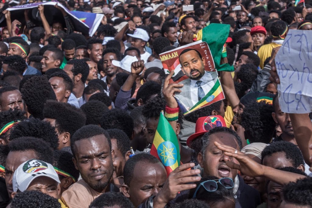 Supporters of Ethiopian Prime Minister Abiy Ahmed attend a rally on Meskel Square in Addis Ababa, 23 June 2018, YONAS TADESSE/AFP/Getty Images