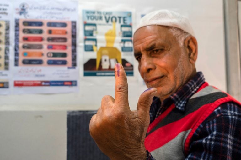 A man shows his finger marked with indelible ink after casting his ballot in Srinagar, Kashmir, India, 18 April 2019, Yawar Nazir/Getty Images