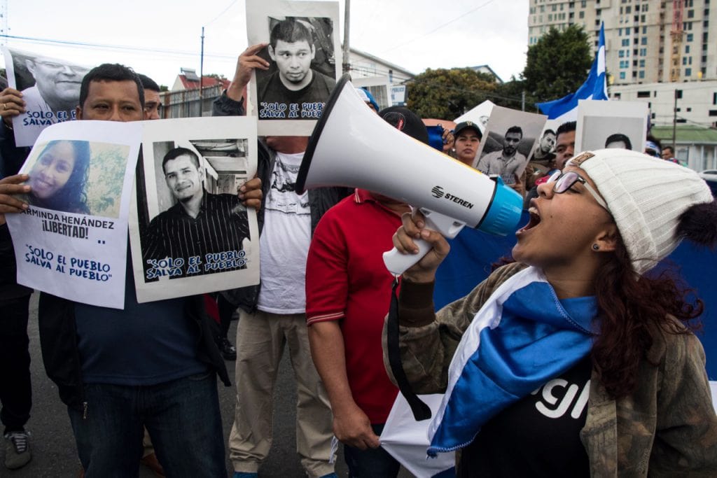 Nicaraguans protest the arrest of journalists Miguel Mora and Lucia Pineda in Nicaragua, during a demonstration outside the Nicaraguan embassy in San Jose, Costa Rica, 22 December 2018, EZEQUIEL BECERRA/AFP/Getty Images