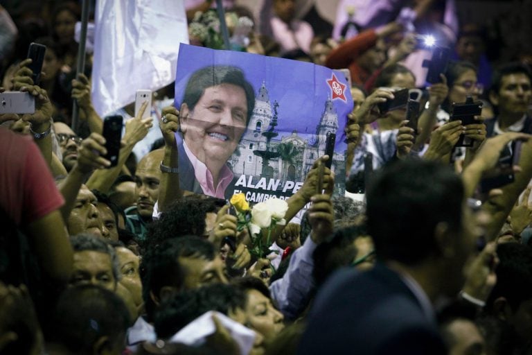 Supporters of former Peruvian President Alan Garcia gather for his funeral at the APRA headquarters in Lima, 17 April 2019, Leonardo Fernandez/Getty Images