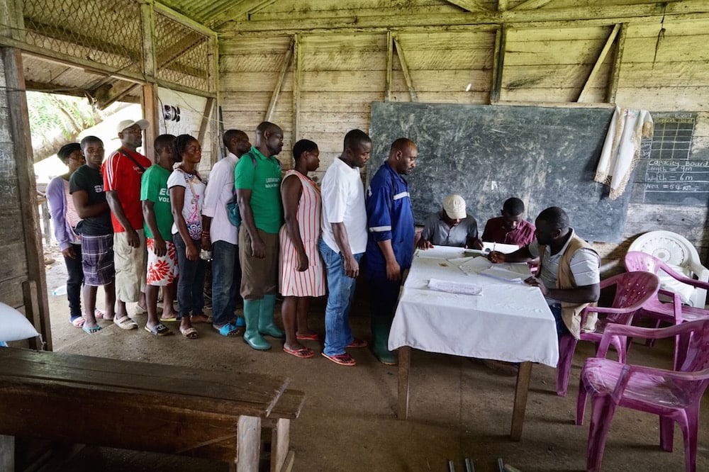 An NGO registers locally displaced residents for humanitarian aid, people who were fleeing violence in Cameroon's Anglophone Territories, in Buea, southwest Cameroon, 11 May 2019, Giles Clarke/UNOCHA via Getty Images