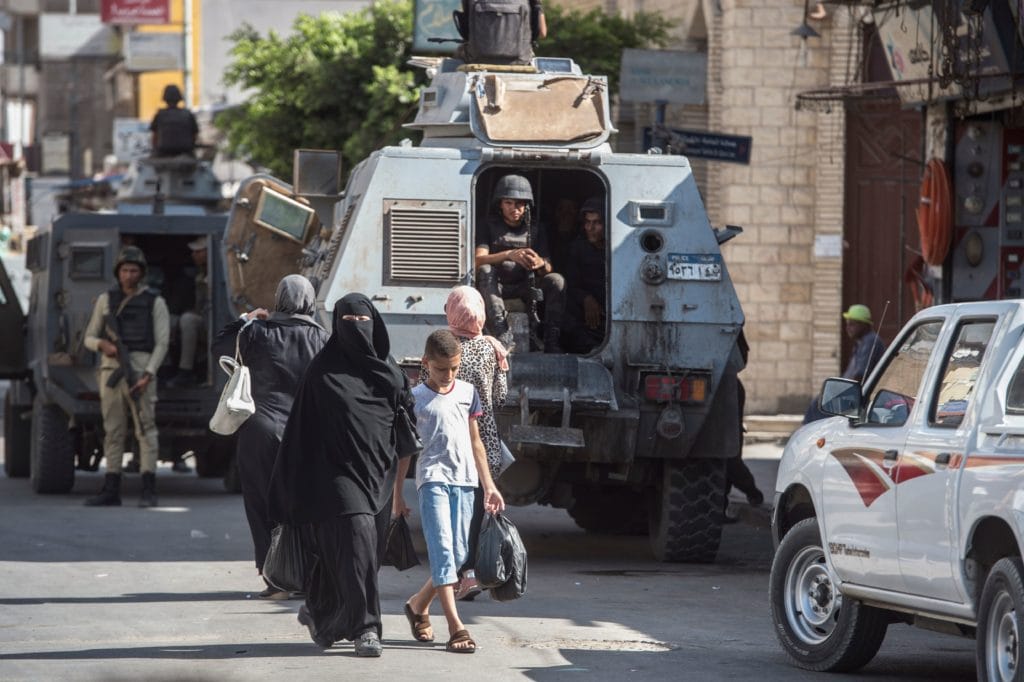 Egyptian policemen guard a street in the North Sinai provincial capital of El-Arish, 16 September 2018, KHALED DESOUKI/AFP/Getty Images