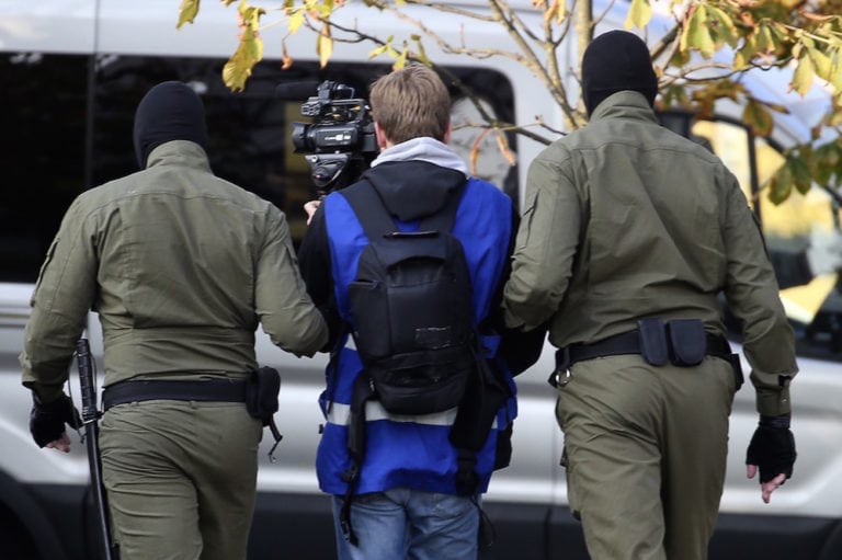 Law enforcement officers detain a journalist during a Women's Solidarity opposition event, in Minsk, Belarus, 19 September 2020, Natalia FedosenkoTASS via Getty Images