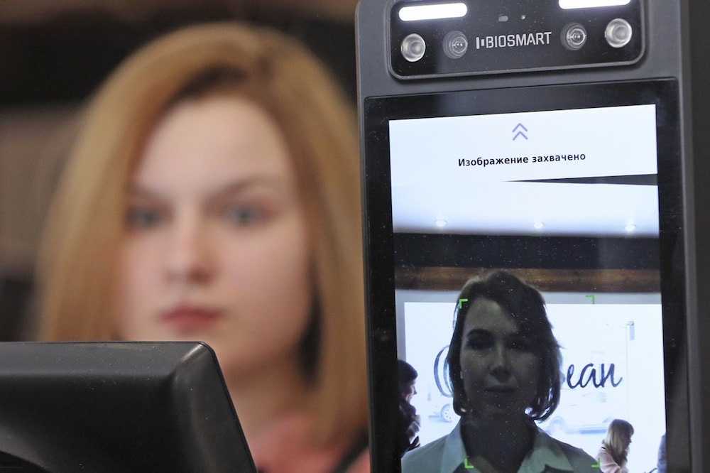 An employee at a cafe, which uses a unified biometric facial recognition system for payments, in Moscow, Russia, 25 March 2020, Gavriil GrigorovTASS via Getty Images