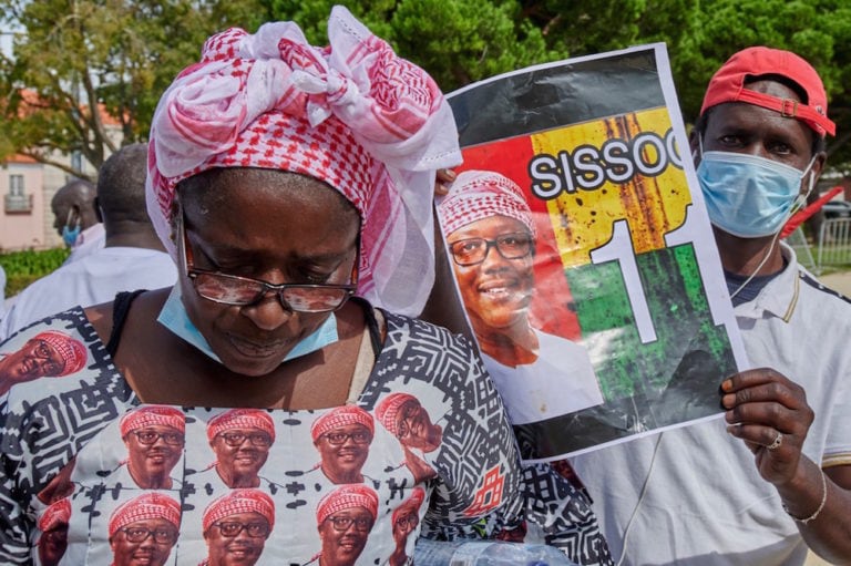 A group of Guinea-Bissau citizens show their support for President Umaro Cissoco Embaló, at the start of his official visit to Lisbon, Portugal, during the Covid-19 pandemic, 8 October 2020, Horacio Villalobos#Corbis/Corbis via Getty Images