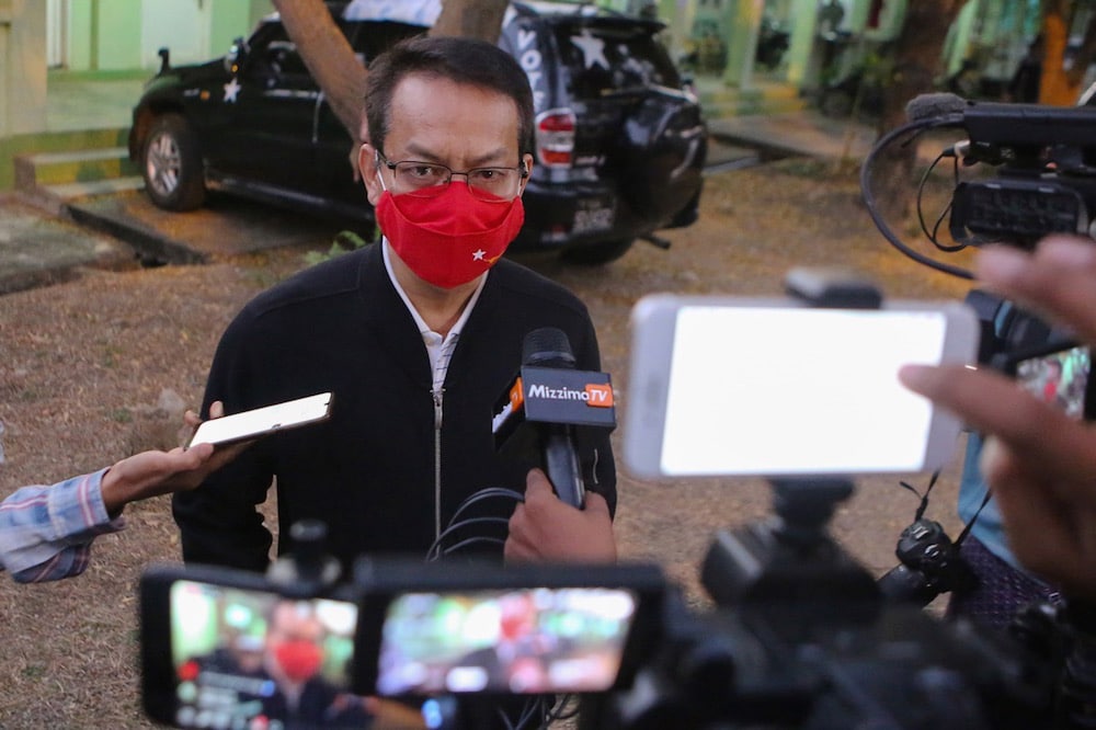 Tin Tun Naing, member of parliament and NLD lower house lawmaker, answers questions from the media at a guesthouse, where parliamentarians stay while attending parliament following the coup, Naypyidaw, Myanmar, 2 February 2021, STR/AFP via Getty Images