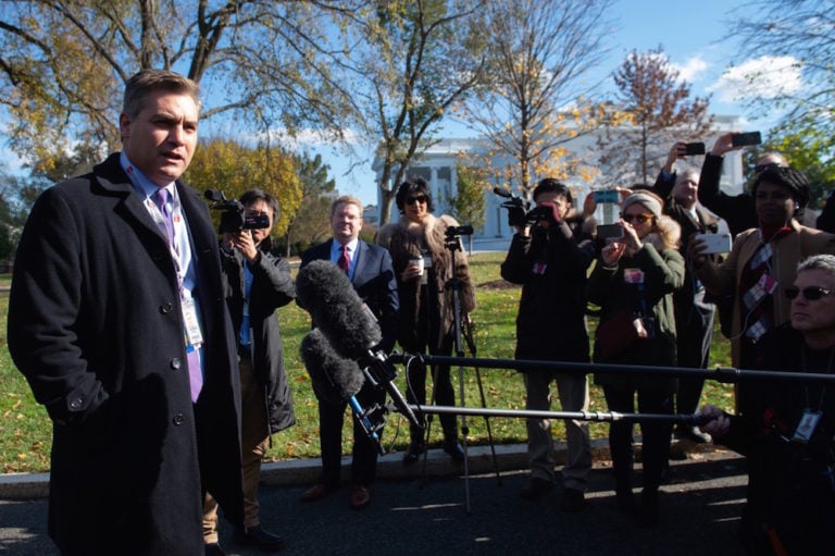 CNN White House correspondent Jim Acosta speaks to the media after arriving at the White House, in Washington, DC, 16 November 2018, after a judge ordered the White House to reinstate his press credentials. SAUL LOEB/AFP via Getty Images