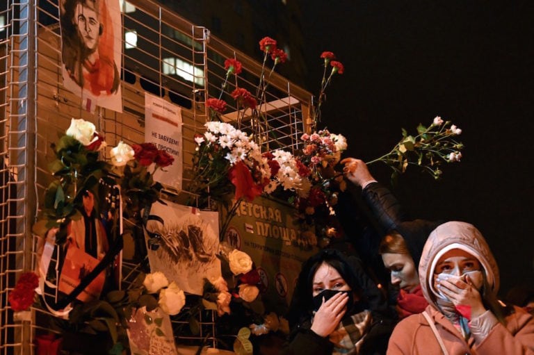 Minsk, Belarus, 12 November 2020. People lay flowers to pay tribute to Raman Bandarenka, a protester who had been beaten to death the previous day, STRINGER/AFP via Getty Images