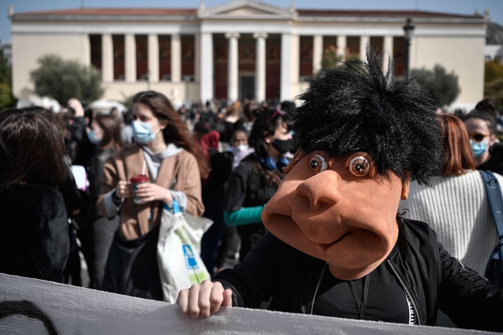 A demonstration against a new mass media law that includes an EU-directive on online terrorist content, which artists say will censor their expression, in Athens, Greece, 11 February 2021, LOUISA GOULIAMAKI/AFP via Getty Images