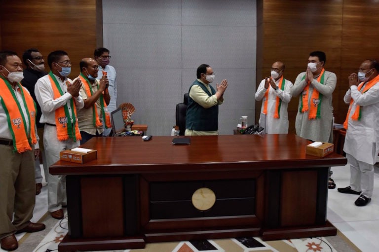 BJP President JP Nadda (c) greets former Congress MLAs from Manipur after they join the BJP, in New Delhi, India, 19 August 2020, Mohd Zakir/Hindustan Times via Getty Images