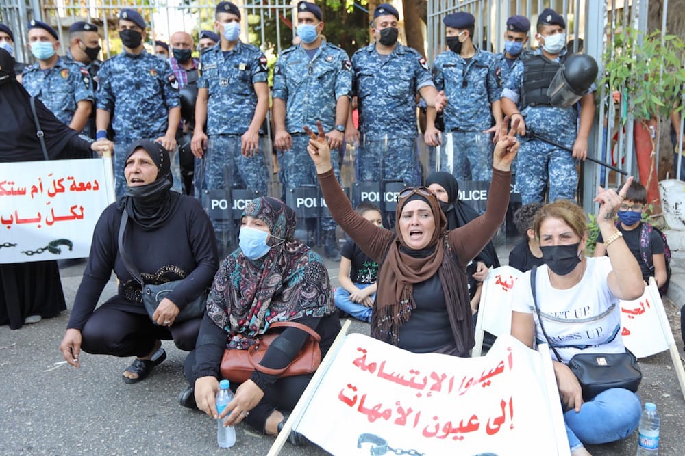 Relatives of inmates at Roumieh prison, demonstrating outside the Ministry of Justice, call for a general amnesty and for the protection of prisoners following the spread of COVID-19 in the facility, Beirut, Lebanon, 14 September 2020, ANWAR AMRO/AFP via Getty Images