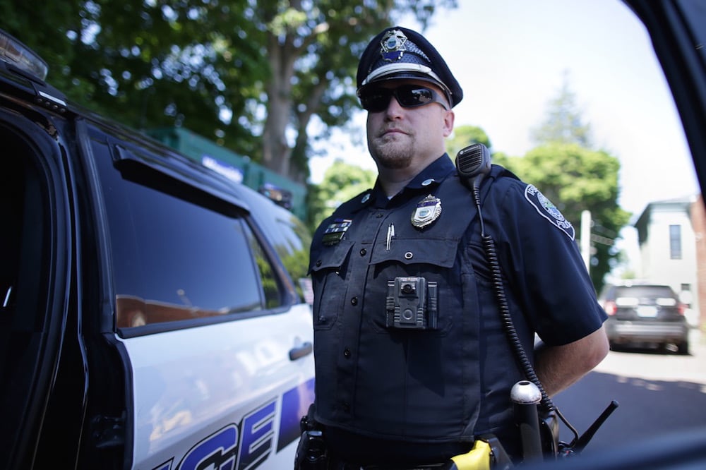 A police officer wears his Watch Guard Body Camera in Ipswich, MA, U.S., 29 July 2020, Jonathan Wiggs/The Boston Globe via Getty Images