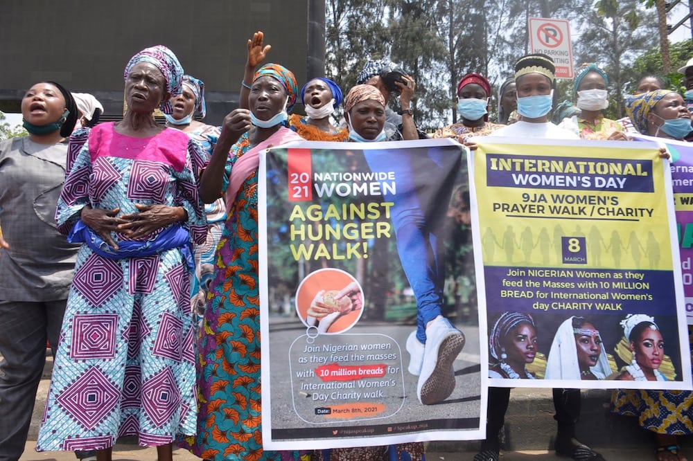 A group of Nigerian women mark International Women's Day and voice their concerns over the recent rise in insecurity, hunger and inequality for women, in Lagos, 8 March 2021, Olukayode Jaiyeola/NurPhoto via Getty Images