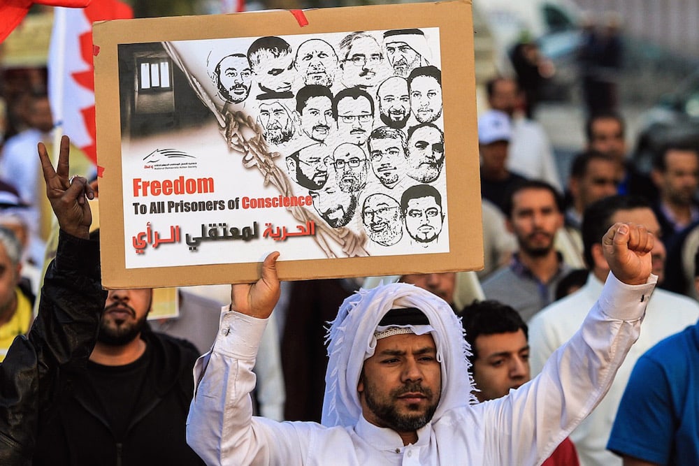 Hundreds of people attend an anti-government protest to demand the release of political detainees, in Manama, Bahrain, 26 December 2014, Ayman Yaqoob/Anadolu Agency/Getty Images