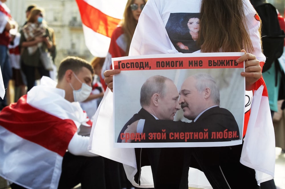 Kiev, Ukraine, 11 October 2020. A protester holds a placard depicting Russian President Vladimir Putin and Belarusian President Alexander Lukashenko during a demonstration in solidarity with the protest movement in Belarus, Pavlo Gonchar/SOPA Images/LightRocket via Getty Images