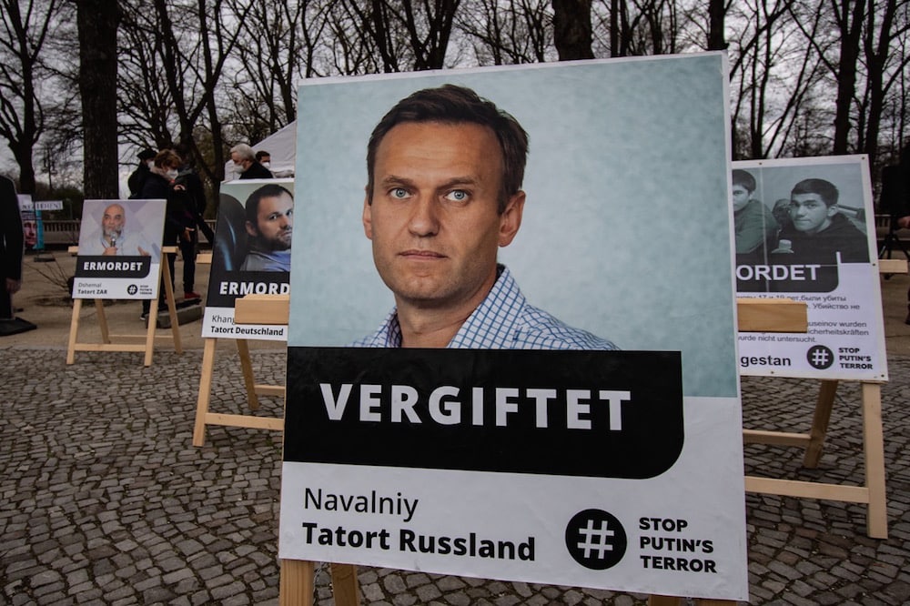 Berlin, Germany, 10 April 2021. Photos of Russian opposition members are placed near the Brandenburg Gate, as organisers call for the release of Alexey Navalny, who is held in a penal camp and on a hunger strike, Paul Zinken/picture alliance via Getty Images