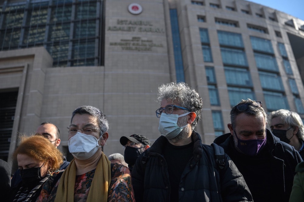 RSF's Turkey representative Erol Önderoglu (C) and physician Sebnem Korur Fincanci (L) speak to the press in front of the courthouse, Istanbul, Turkey, 3 February 2021, OZAN KOSE/AFP via Getty Images