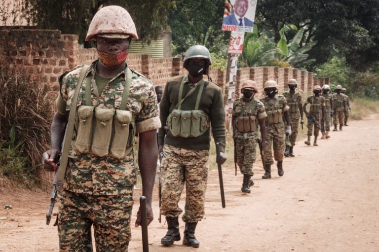 Soldiers patrol in Magere, Uganda, 18 January 2021, YASUYOSHI CHIBA/AFP via Getty Images