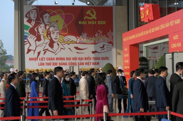 Delegates arrive to attend the closing ceremony of the Communist Party of Vietnam 13th National Congress, at the National Convention Centre, Hanoi, 1 February 2021, NHAC NGUYEN/AFP via Getty Images
